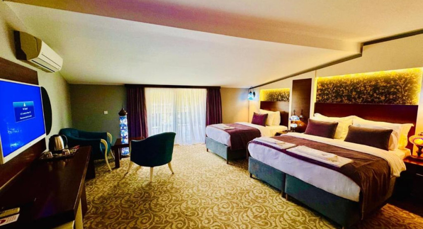 Deluxe Triple Room with Balcony