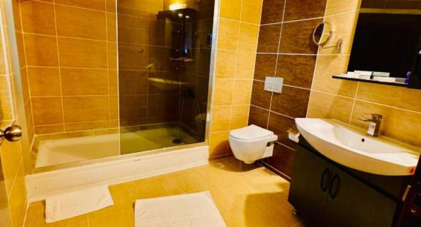 Deluxe Quadruple Room with Balcony