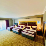 Deluxe Quadruple Room with Balcony