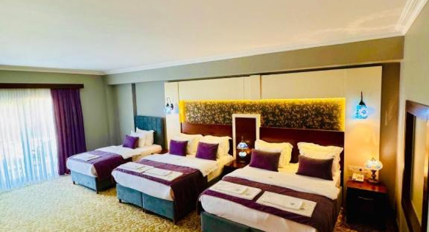 Deluxe Quadruple Room with Balcony