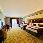 Deluxe Quadruple Room with Balcony