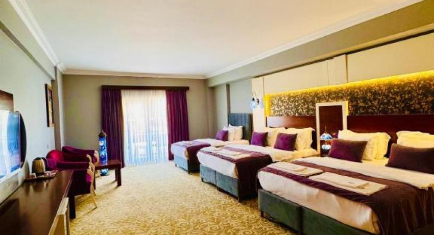 Deluxe Quadruple Room with Balcony