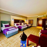 Deluxe Quadruple Room with Balcony