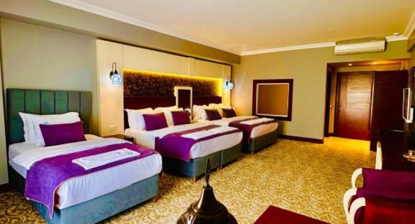 Deluxe Quadruple Room with Balcony